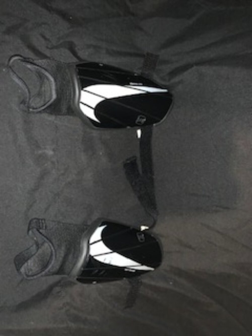 Sleek Black & White Soccer Shin Guards — Lightweight Leg Protection